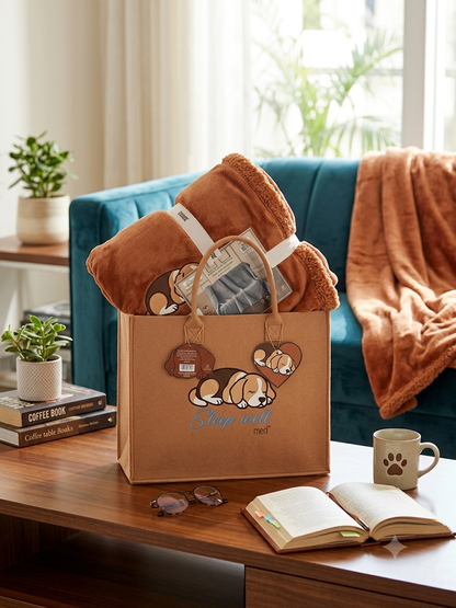 Plaid con soffice sherpa in una chic borsa in panno.