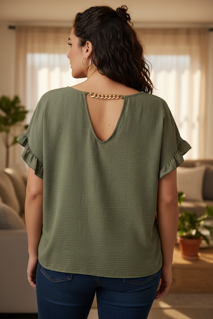 Blusa con voilant e scollo gioiello